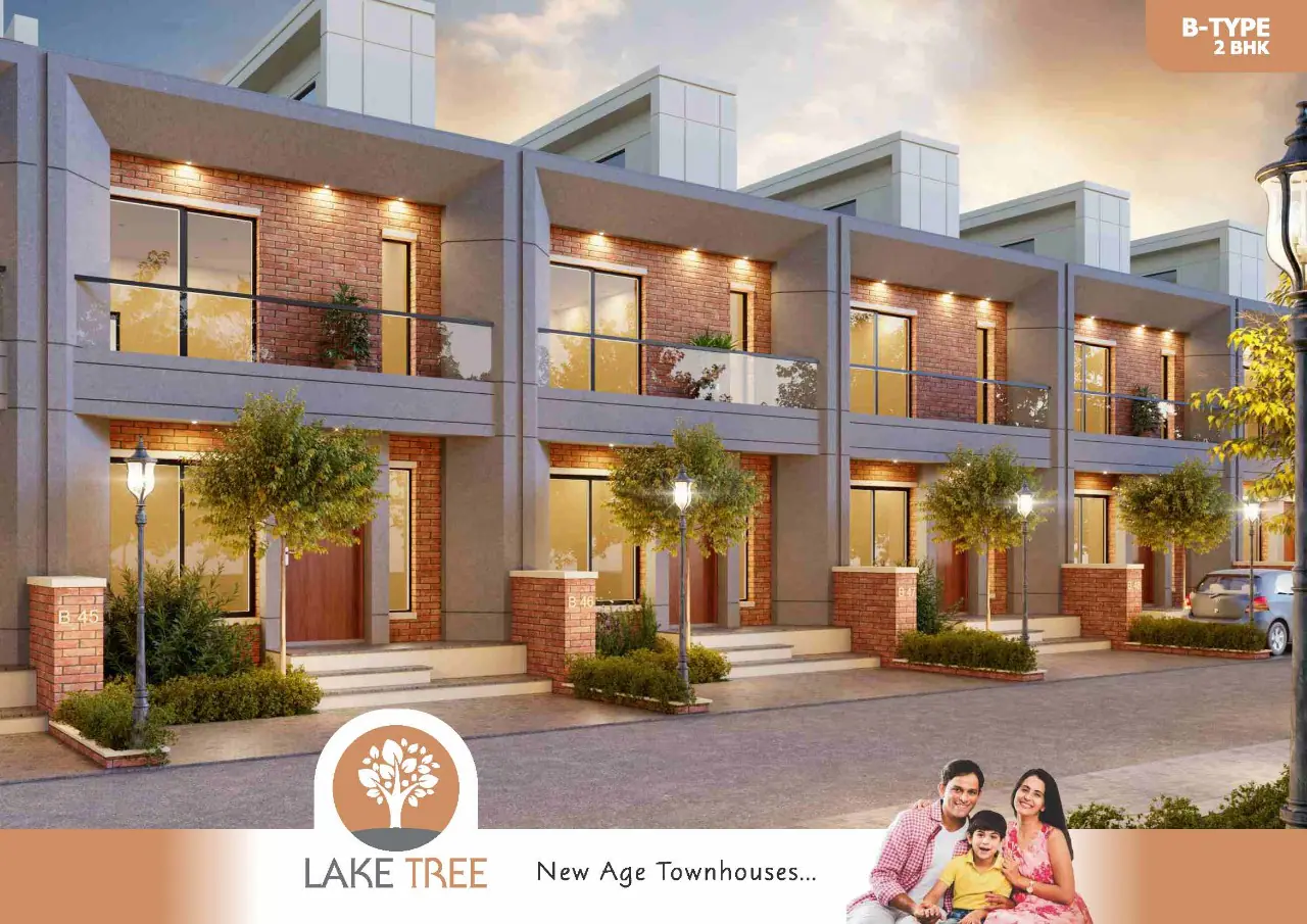 Lake Tree, Ajwa Main Road: a row of 2 BHK B-type townhouses with brick fronts, balconies and lit entrances at dusk